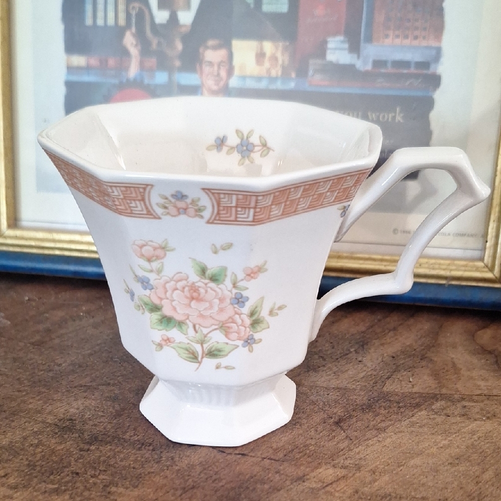 Nikko Ceramics Floral Teacup with Peach and Blue Accents